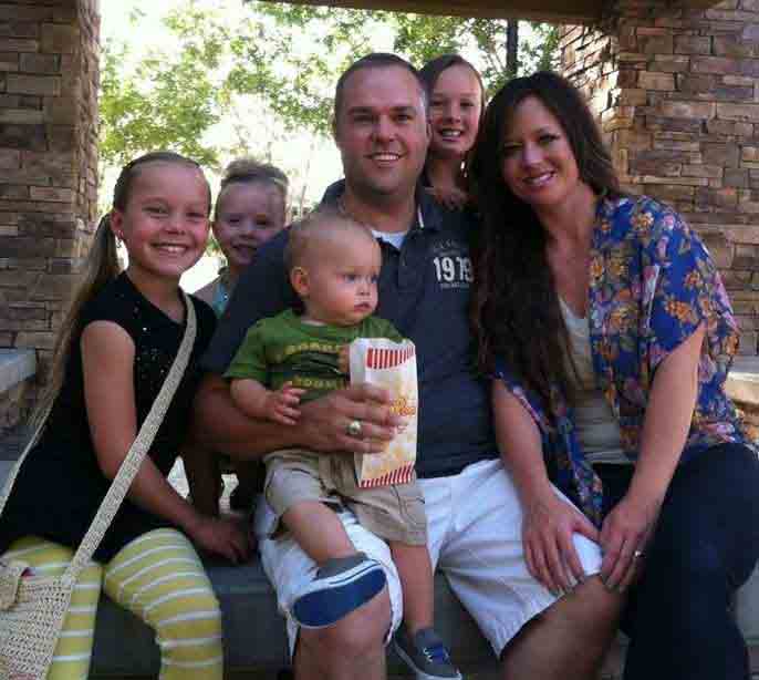 Shane Osmond poses for a picture with his family.